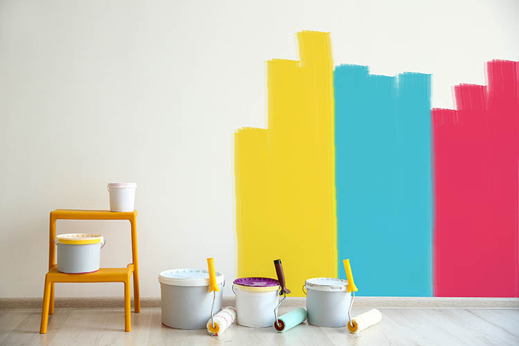 paint rollers with multiple color choices against white wall | Jacksonville, IL