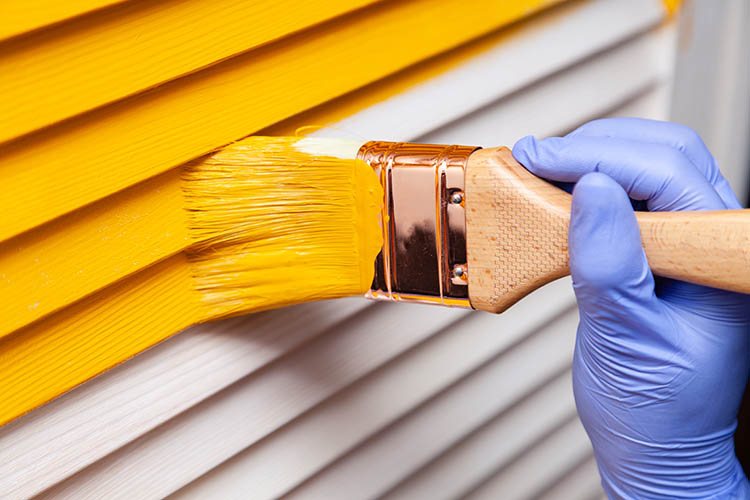 Exterior painting, bright yellow paint | Jacksonville, IL